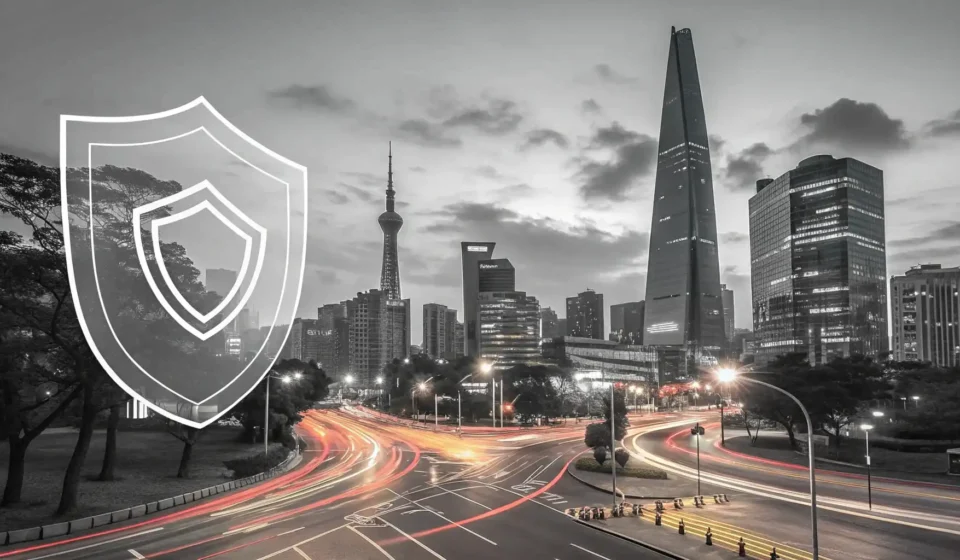 How to Say Information Security Management System (ISMS) in Korean Modern Seoul cityscape at dusk with a subtle, glowing digital shield icon superimposed, representing...