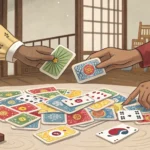 How to Say Patent Troll in Korean Two pairs of hands reaching for Korean Hwatu playing cards on a wooden surface, symbolizing siblings...