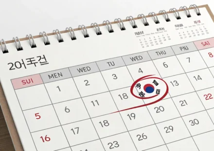 Stylized Korean calendar highlighting a date, symbolizing learning about the meaning of Korean natio...