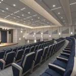 Rows of empty seats inside a Korean theater, illustrating the concept of choosing or changing seats...
