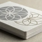Stack of modern business cards on a counter, representing ordering business cards in a Korean settin...